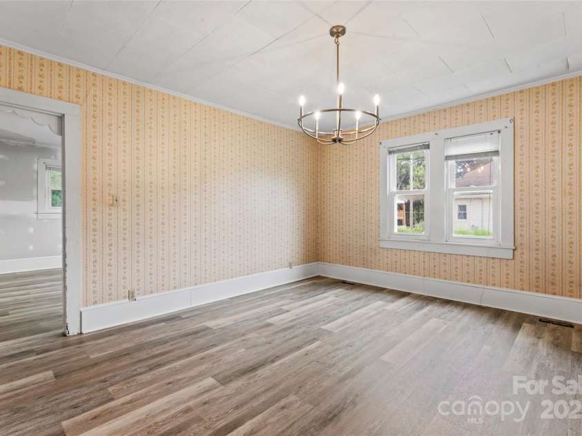 2407 Main Street, Kannapolis, NC 28081.  MLS# CAR4288336, YatesRealty ID 32559. Dining room looking into kitchen