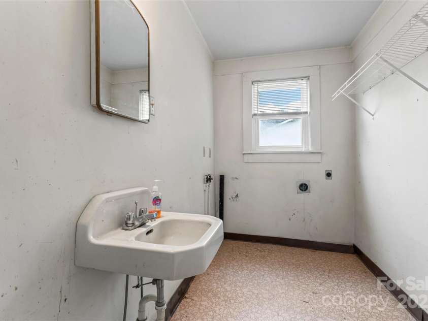 2407 Main Street, Kannapolis, NC 28081.  MLS# CAR4288336, YatesRealty ID 32559. Laundry room with utility sink