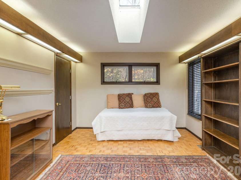 250 Butternut Lane, Brevard, NC 28712.  MLS# CAR4316894, YatesRealty ID 3256. Main level Bedroom