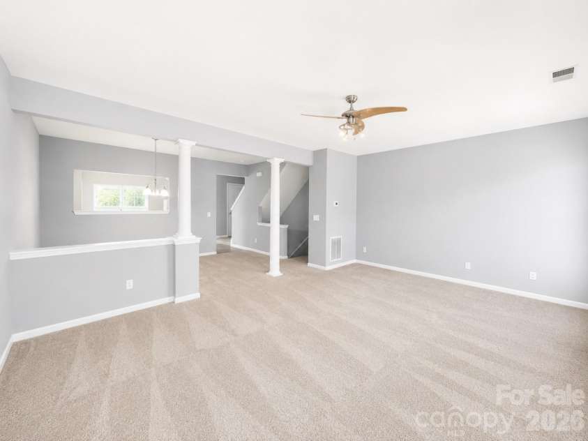 9815 Treeside Lane, Matthews, NC 28105.  MLS# CAR4395672, YatesRealty ID 32563. Living Room