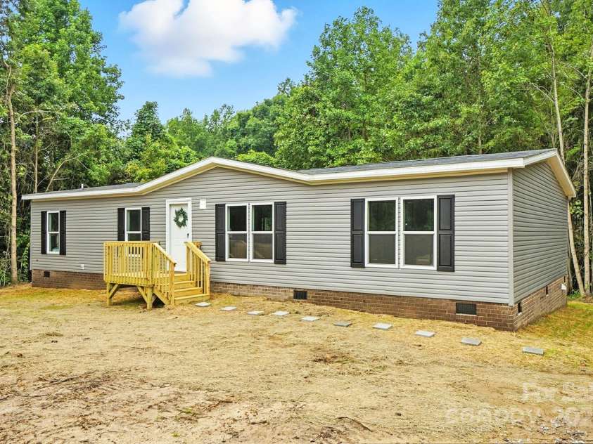 161 Crepe Myrtle Lane, Wadesboro, NC 28170.  MLS# CAR4278940, YatesRealty ID 32569. New Construction Home w/ Over 1 Acre set on a very private lot.