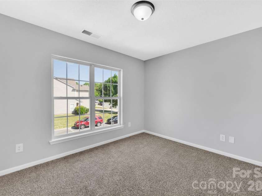 8558 Carolina Lily Lane, Charlotte, NC 28262.  MLS# CAR4396852, YatesRealty ID 32571. 