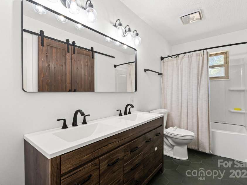 305 Ridge Drive, Mount Holly, NC 28120.  MLS# CAR4285366, YatesRealty ID 32572. 