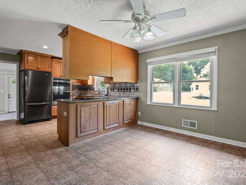 305 Ridge Drive, Mount Holly, NC 28120.  MLS# CAR4285366, YatesRealty ID 32572. 