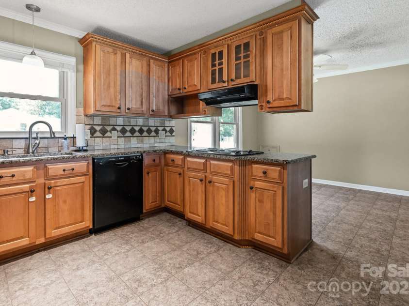 305 Ridge Drive, Mount Holly, NC 28120.  MLS# CAR4285366, YatesRealty ID 32572. 