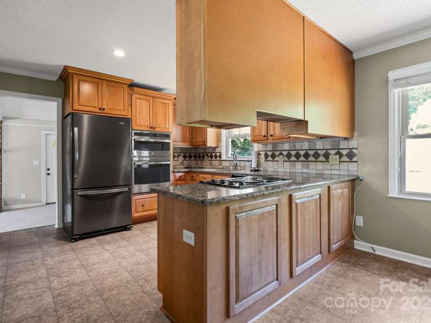 305 Ridge Drive, Mount Holly, NC 28120.  MLS# CAR4285366, YatesRealty ID 32572. 