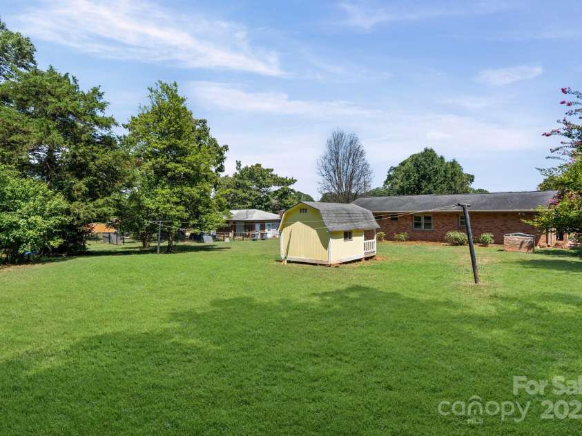 305 Ridge Drive, Mount Holly, NC 28120.  MLS# CAR4285366, YatesRealty ID 32572. 