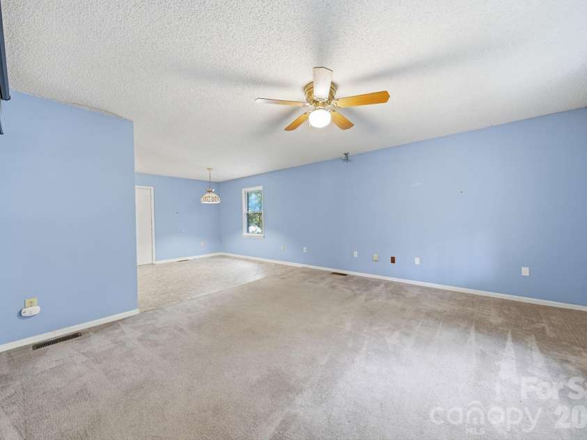 11488 Beagle Street, Midland, NC 28107.  MLS# CAR4397037, YatesRealty ID 32579. Living Room.