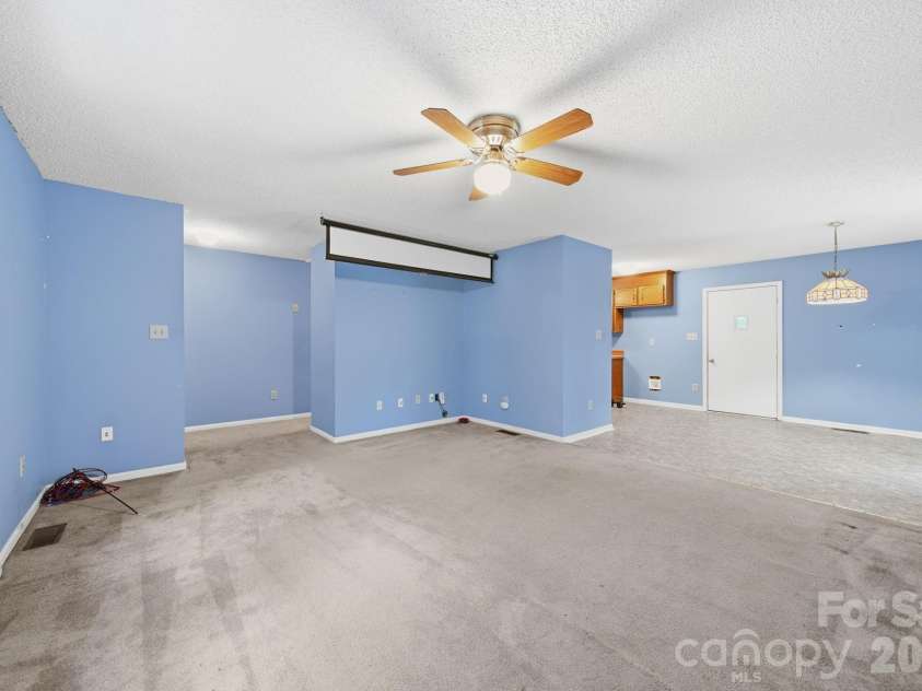 11488 Beagle Street, Midland, NC 28107.  MLS# CAR4397037, YatesRealty ID 32579. Living Room..