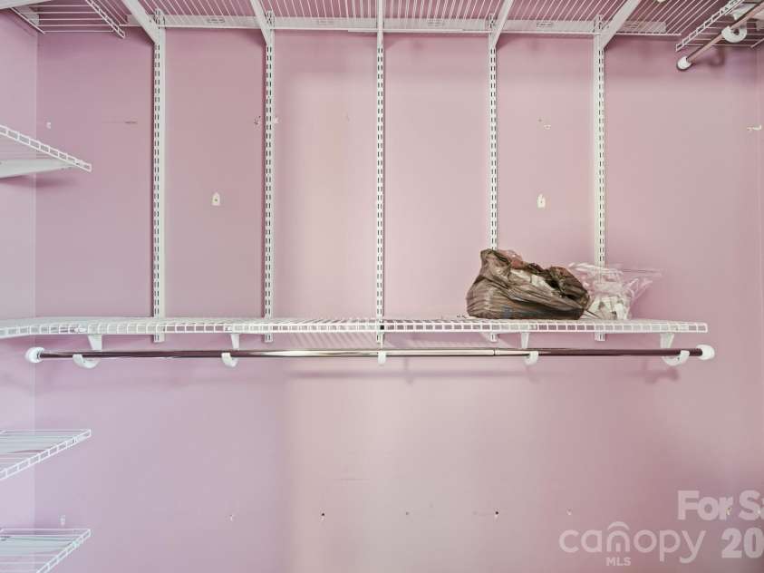 11488 Beagle Street, Midland, NC 28107.  MLS# CAR4397037, YatesRealty ID 32579. Primary Bedroom Closet.