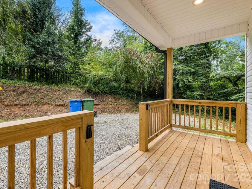 92 Moody Avenue, Candler, NC 28715.  MLS# CAR4291918, YatesRealty ID 32579. Covered front porch