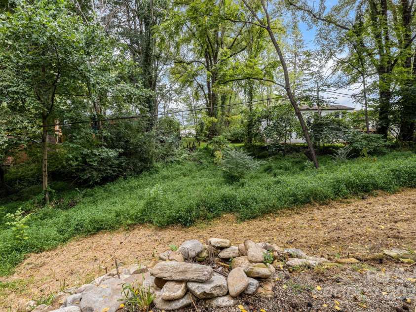 92 Moody Avenue, Candler, NC 28715.  MLS# CAR4291918, YatesRealty ID 32579. Fire Pit