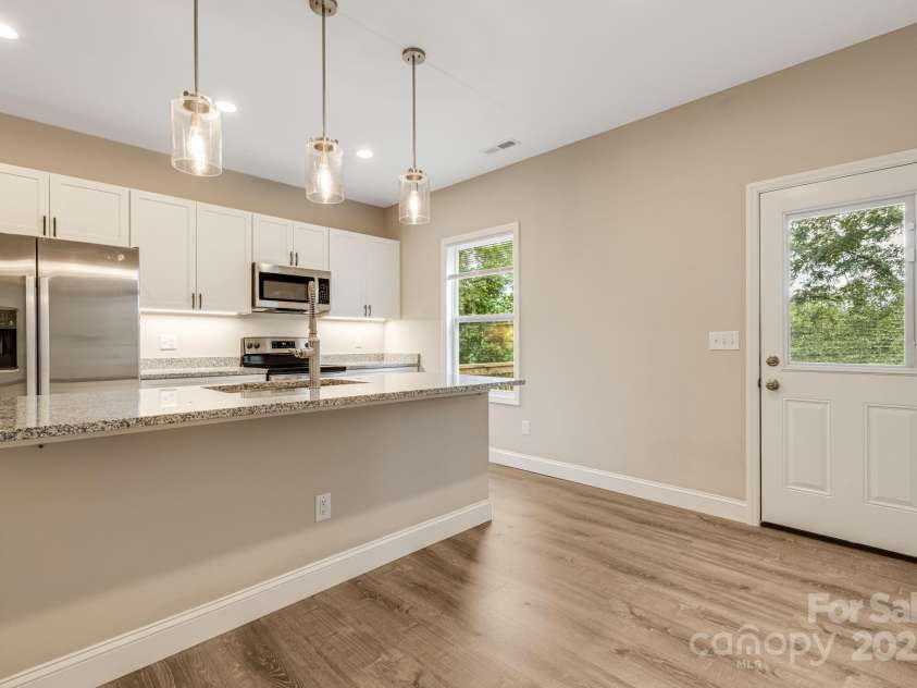 92 Moody Avenue, Candler, NC 28715.  MLS# CAR4291918, YatesRealty ID 32579. Kitchen with Island