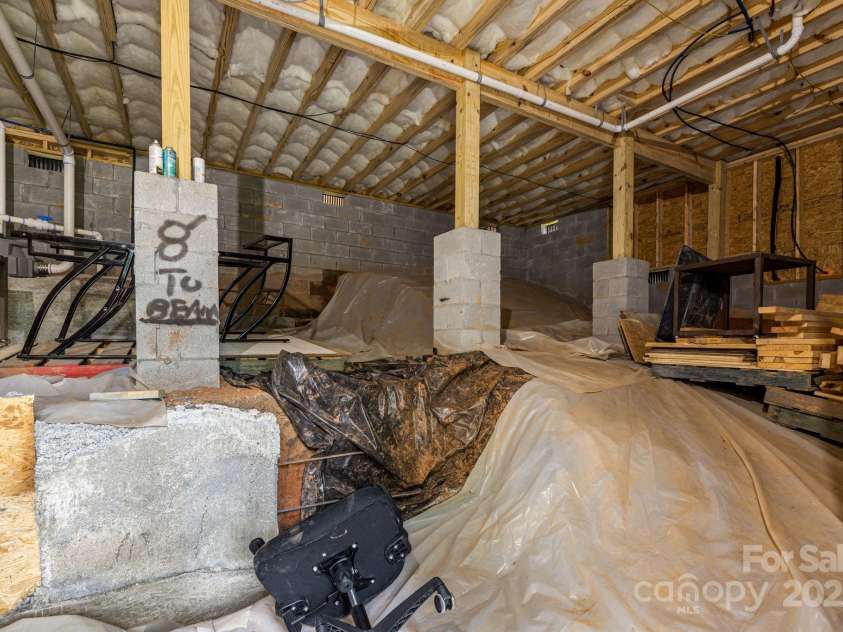 92 Moody Avenue, Candler, NC 28715.  MLS# CAR4291918, YatesRealty ID 32579. Large Basement/Crawl Space