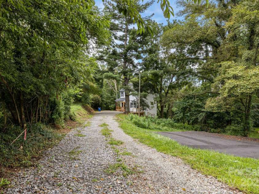 92 Moody Avenue, Candler, NC 28715.  MLS# CAR4291918, YatesRealty ID 32579. Long, flat driveway