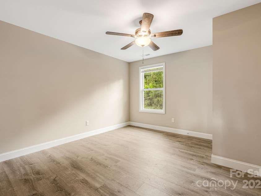 92 Moody Avenue, Candler, NC 28715.  MLS# CAR4291918, YatesRealty ID 32579. Upstairs Bedroom