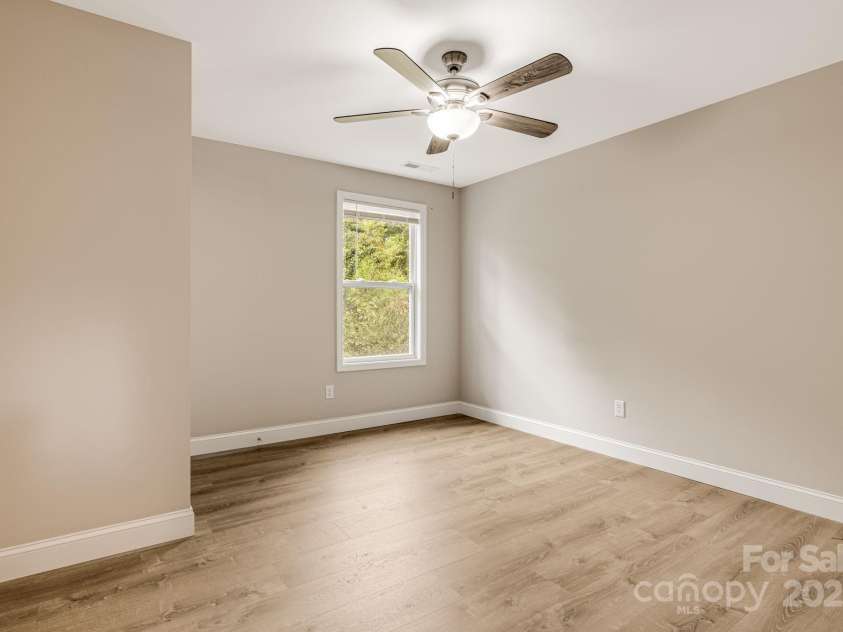 92 Moody Avenue, Candler, NC 28715.  MLS# CAR4291918, YatesRealty ID 32579. Upstairs Bedroom