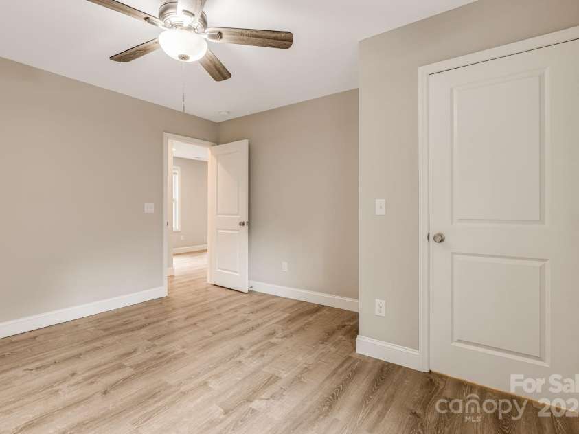 92 Moody Avenue, Candler, NC 28715.  MLS# CAR4291918, YatesRealty ID 32579. Upstairs Bedroom