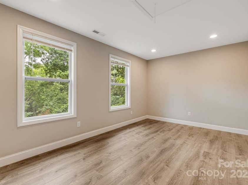 92 Moody Avenue, Candler, NC 28715.  MLS# CAR4291918, YatesRealty ID 32579. Upstairs Family Room