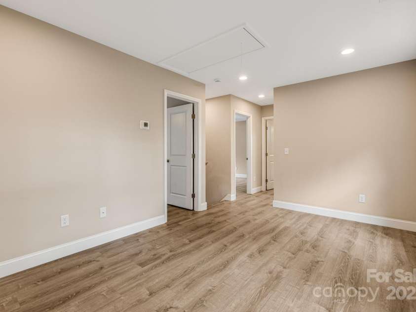 92 Moody Avenue, Candler, NC 28715.  MLS# CAR4291918, YatesRealty ID 32579. Upstairs Family Room