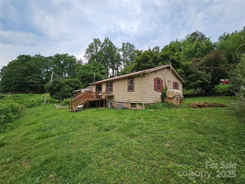 573 Uptons Landing Road, Marion, NC 28752.  MLS# CAR4278162, YatesRealty ID 3258. Back yard