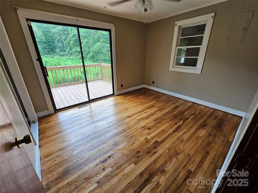 573 Uptons Landing Road, Marion, NC 28752.  MLS# CAR4278162, YatesRealty ID 3258. Bedroom 3 w attached Deck