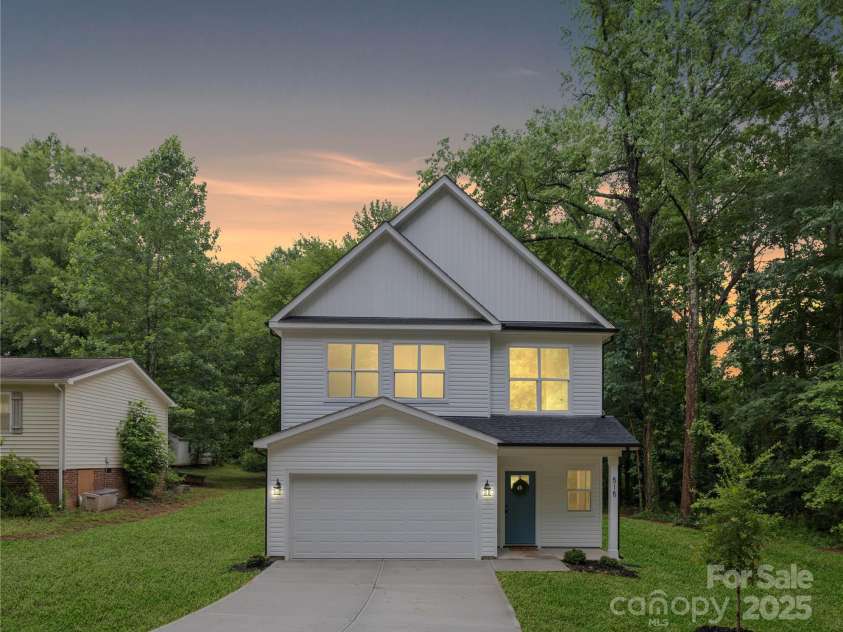 7034 Lakeside Drive, Charlotte, NC 28215.  MLS# CAR4322126, YatesRealty ID 3258. Photos are representative from previous build - fiber cement siding. Cobblestone color