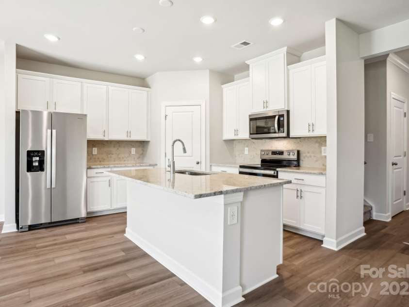 107 Heritage Valley Court, Mocksville, NC 27028.  MLS# CAR4277131, YatesRealty ID 32587. Photo is not of the actual home but is an inspirational photo of builder’s model home and may depict options, furnishings, and/or decorator features that are not included.