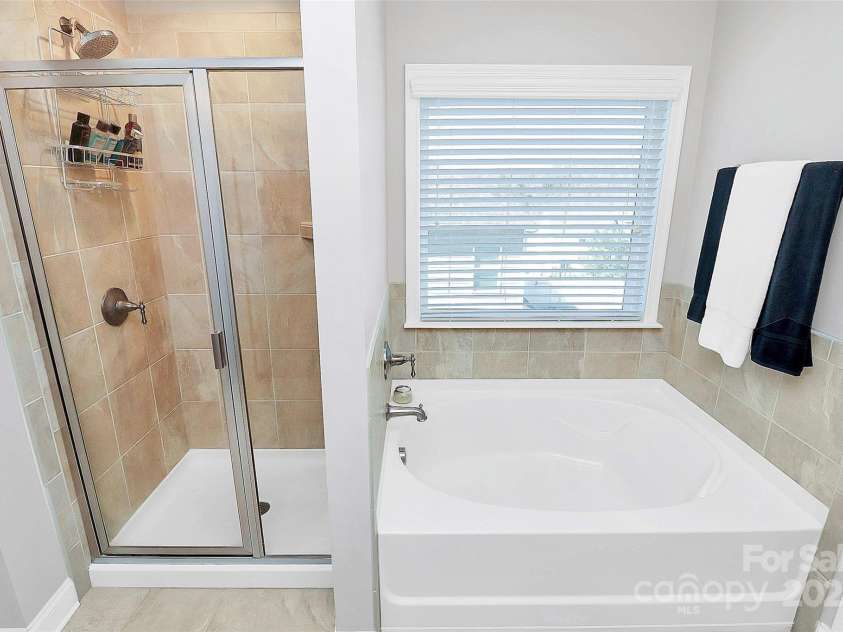 815 Oak Embers Drive, Concord, NC 28025.  MLS# CAR4229290, YatesRealty ID 3259. Primary bath