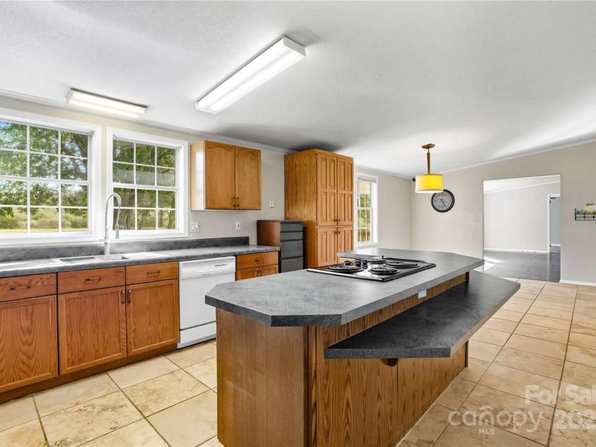 1116 Lewis Ferry Road, Statesville, NC 28677.  MLS# CAR4311790, YatesRealty ID 32594. Kitchen with island