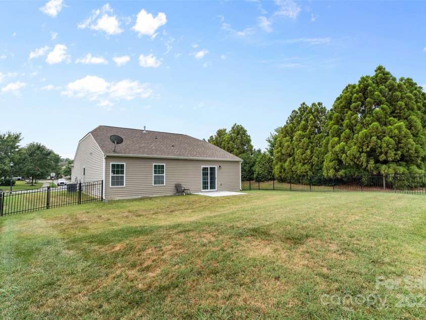 4711 William Caldwell Avenue, Charlotte, NC 28213.  MLS# CAR4289224, YatesRealty ID 32598. Lovely, fenced backyard!  No neighbors on one side :)