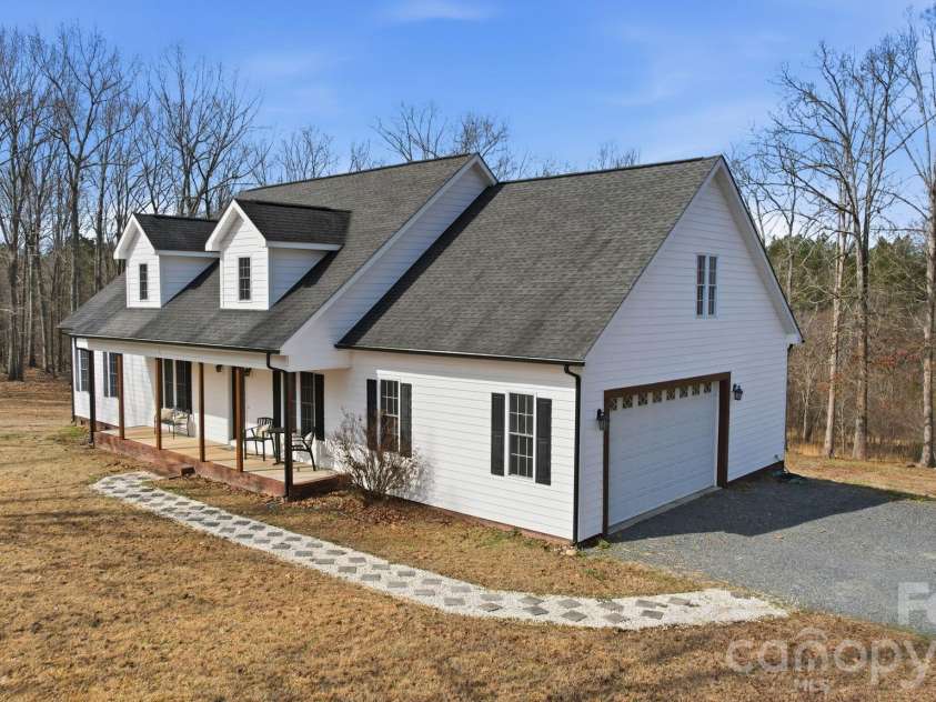 10962 Busbin Road, Mount Pleasant, NC 28124.  MLS# CAR4352597, YatesRealty ID 3260. Beautiful 2-story home situated on 6.5 acres in Mt. Pleasant.