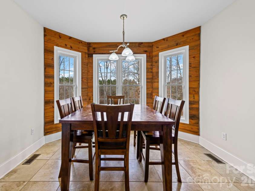 10962 Busbin Road, Mount Pleasant, NC 28124.  MLS# CAR4352597, YatesRealty ID 3260. Breakfast nook overlooking the private backyard.