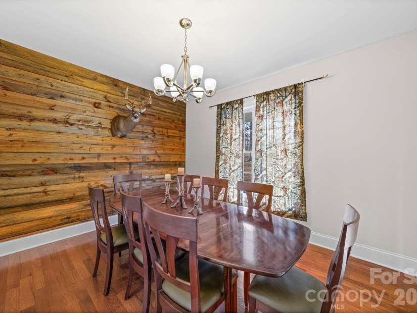 10962 Busbin Road, Mount Pleasant, NC 28124.  MLS# CAR4352597, YatesRealty ID 3260. Dining room with accent wall.