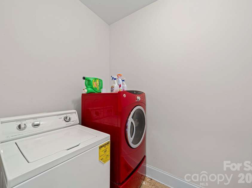 10962 Busbin Road, Mount Pleasant, NC 28124.  MLS# CAR4352597, YatesRealty ID 3260. Laundry room with washer and dryer.