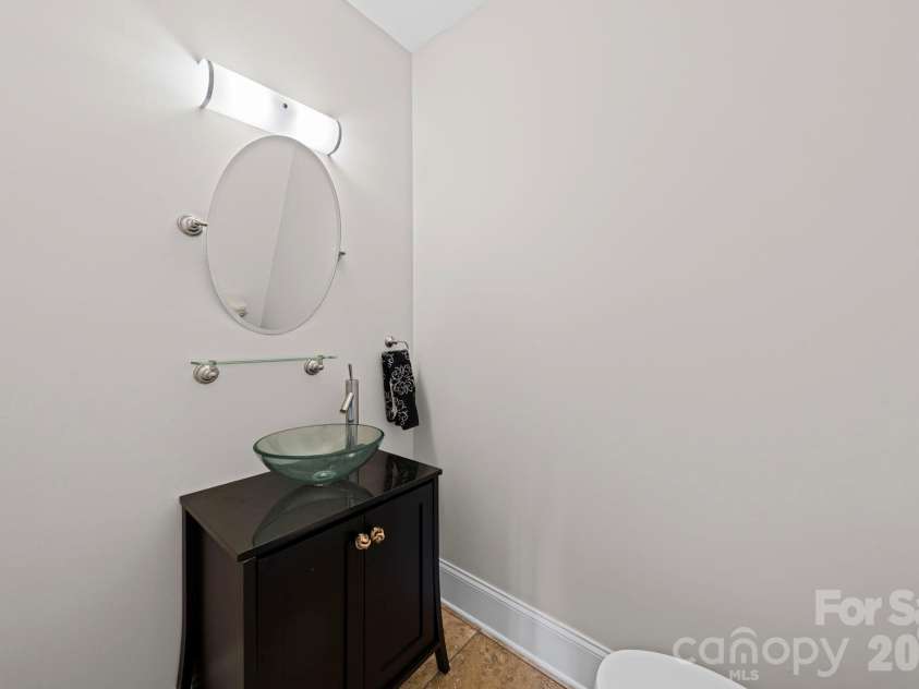 10962 Busbin Road, Mount Pleasant, NC 28124.  MLS# CAR4352597, YatesRealty ID 3260. Main level half-bath in hallway.