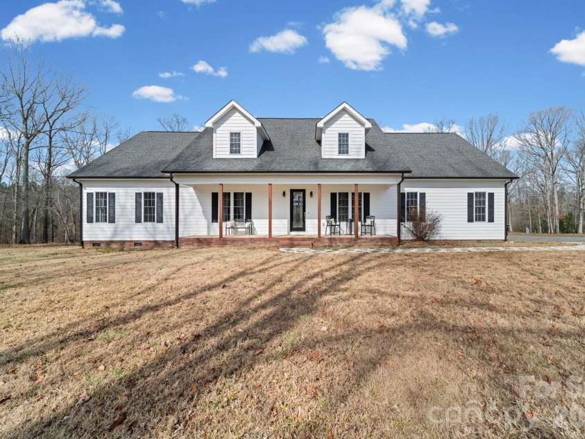 10962 Busbin Road, Mount Pleasant, NC 28124.  MLS# CAR4352597, YatesRealty ID 3260. Nice Cape Cod style positioned in the middle of this property.