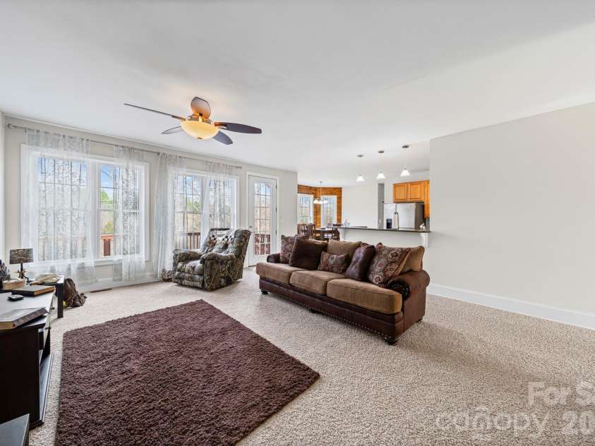10962 Busbin Road, Mount Pleasant, NC 28124.  MLS# CAR4352597, YatesRealty ID 3260. Open floor plan connects the kitchen, dining and living areas. 