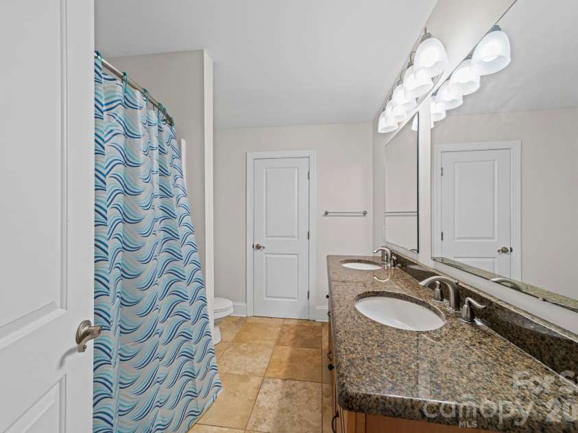 10962 Busbin Road, Mount Pleasant, NC 28124.  MLS# CAR4352597, YatesRealty ID 3260. Upstairs bathroo, with tile floor and granite countertops.