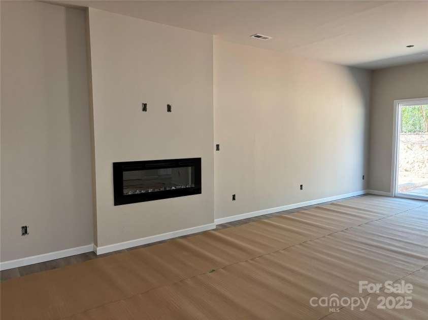 2019 McDonald Drive, Charlotte, NC 28216.  MLS# CAR4238409, YatesRealty ID 3260. New modern fireplace