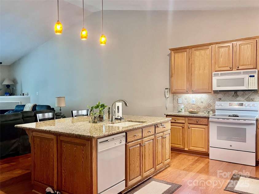 4705 Willow Glen Road, Harrisburg, NC 28075.  MLS# CAR4287918, YatesRealty ID 32600. Kitchen - Bar/Granite