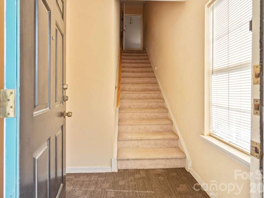 2834 Iron Gate Lane, Charlotte, NC 28212.  MLS# CAR4397335, YatesRealty ID 32601. Private Entry Staircase to Unit