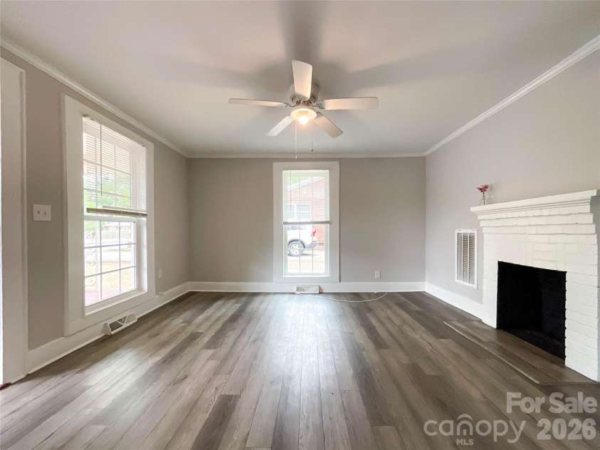 307 Leonard Avenue, Albemarle, NC 28001.  MLS# CAR4394621, YatesRealty ID 32605. Living room