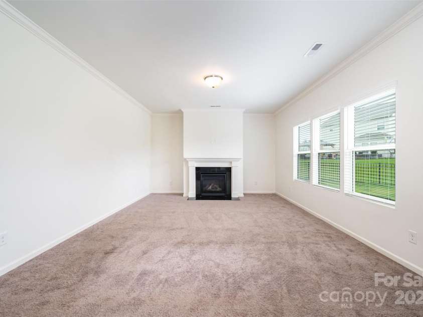 4630 Bent Green Lane, Monroe, NC 28112.  MLS# CAR4288648, YatesRealty ID 32608. Great room with gas log fireplace