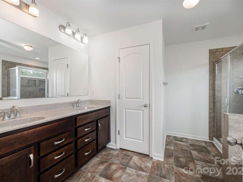 4630 Bent Green Lane, Monroe, NC 28112.  MLS# CAR4288648, YatesRealty ID 32608. Primary bath