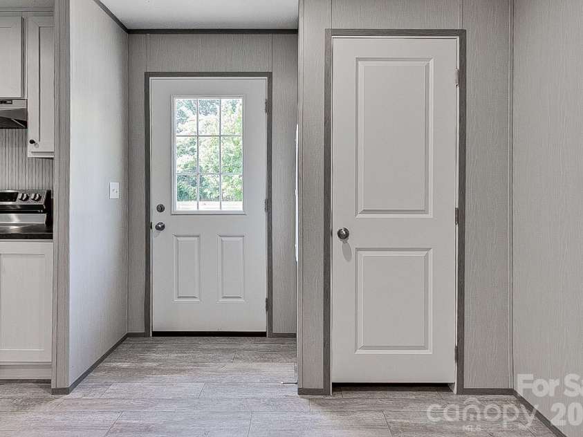 1848 Brittany Trail, Pleasant Garden, NC 27313.  MLS# CAR4394357, YatesRealty ID 32616. Door to back deck