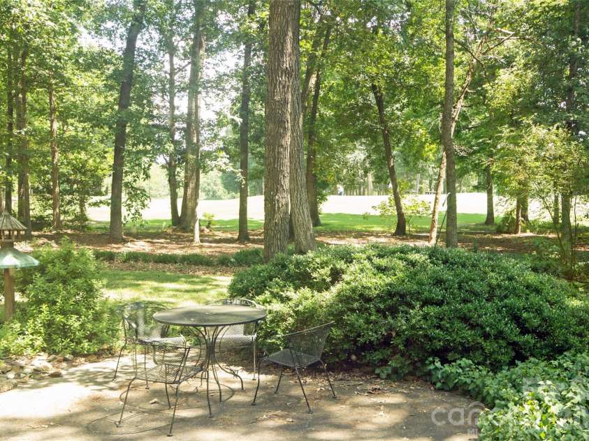 2638 Rolling Hills Drive, Monroe, NC 28110.  MLS# CAR4394198, YatesRealty ID 32619. Back yard view of golf course.