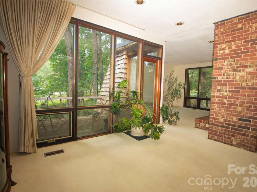 2638 Rolling Hills Drive, Monroe, NC 28110.  MLS# CAR4394198, YatesRealty ID 32619. Dining room area with a private deck access that overlooks the front yard.