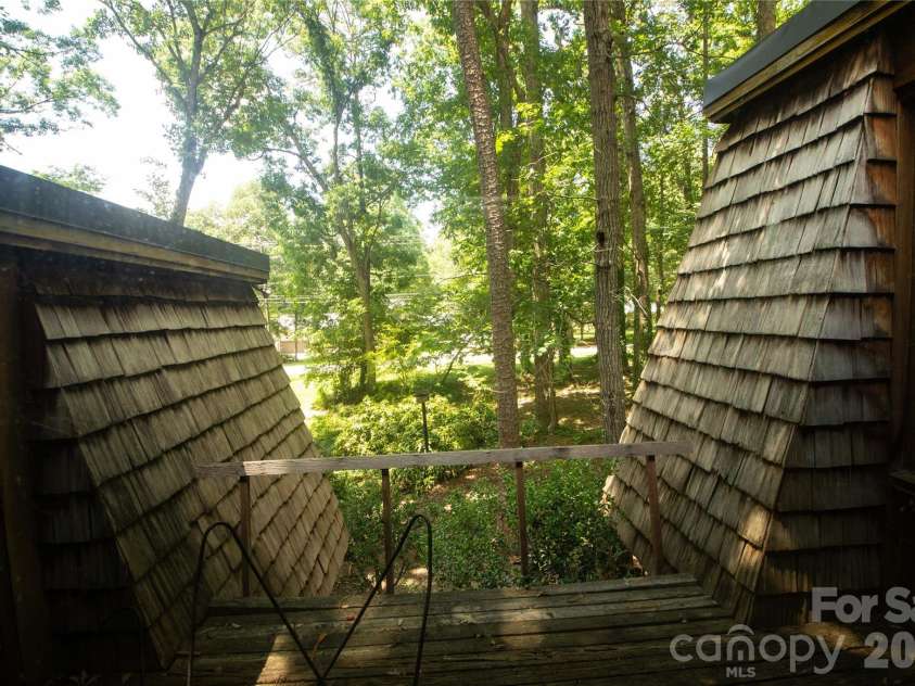 2638 Rolling Hills Drive, Monroe, NC 28110.  MLS# CAR4394198, YatesRealty ID 32619. Dining room view of the private deck and front yard area.