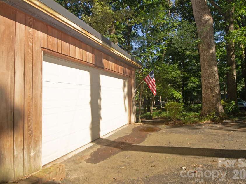 2638 Rolling Hills Drive, Monroe, NC 28110.  MLS# CAR4394198, YatesRealty ID 32619. Side entry 2-car garage.  Offers ample space for storage too.